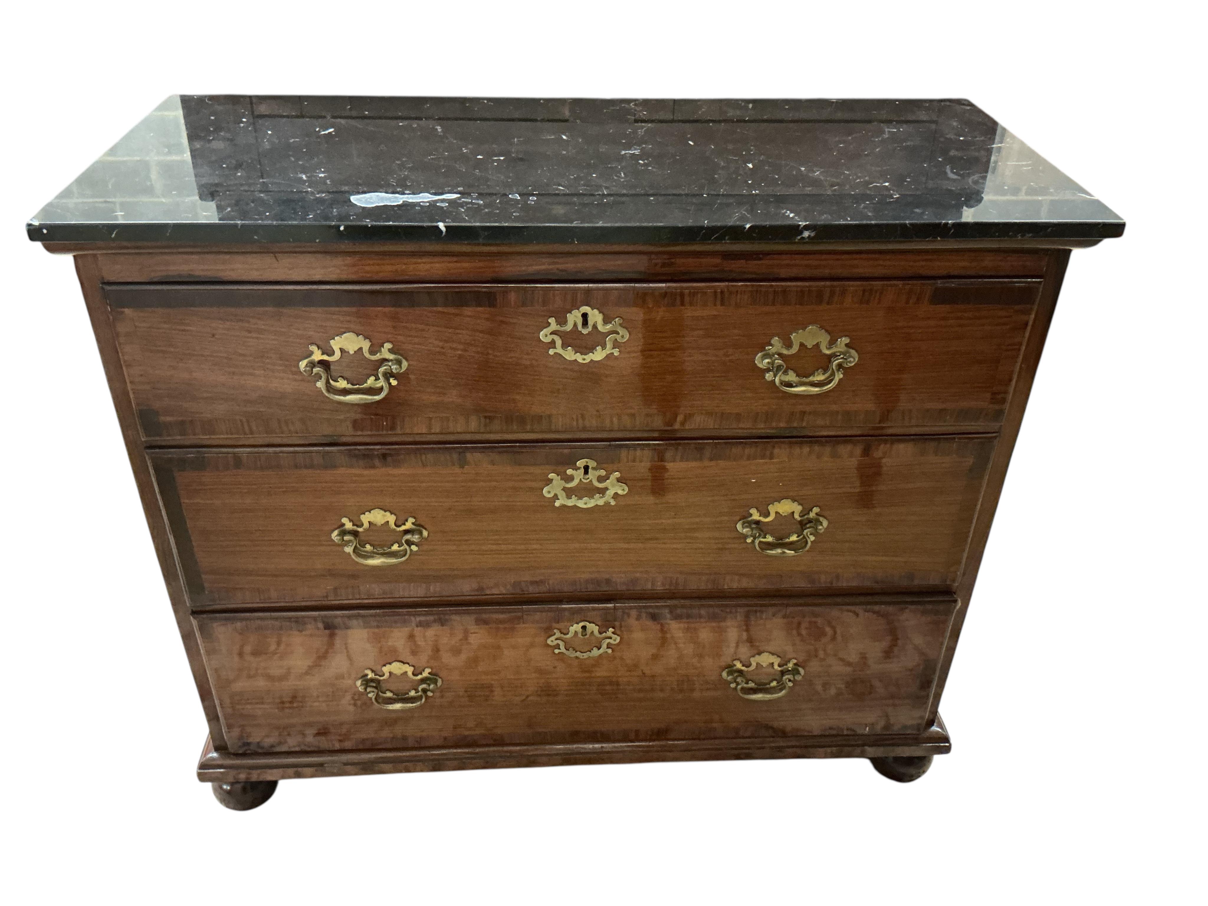 An 18th century and later rosewood veneered chest with associated reconstituted black marble top, width 106cm, depth 46cm, height 88cm